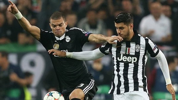 Real Madrid players competing for the ball during a match. Channel i News - চ্যানেল আই নিউজ