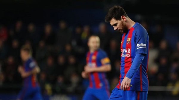 Lionel Messi in FC Barcelona kit looking down during match. Channel i News - চ্যানেল আই নিউজ