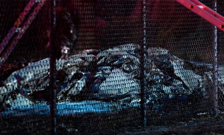 2019 June 21 CTY HSA PHOTO BY BRUCE ASATO  basato@staradvertiser.com  
Remnants of an aircraft carrying 9 people lays on the ground near a fence that surrounds Dillingham Airfield in Mokuleia, just off  Farrington Highway, Friday, June 21, 2019.