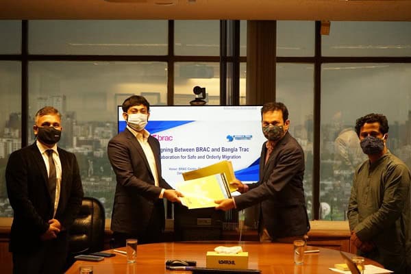BRAC and Bangladesh Trac collaboration signing ceremony in a conference room. Channel i News - চ্যানেল আই নিউজ