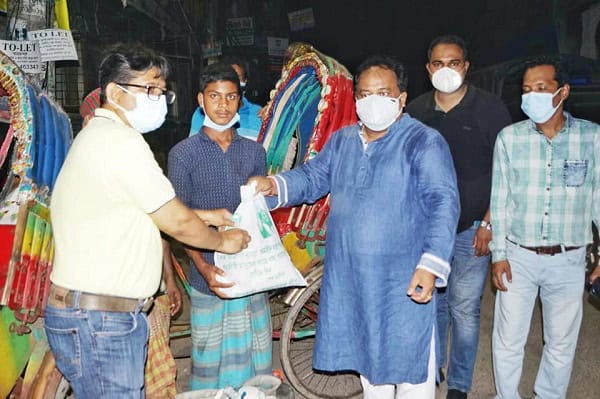 দুঃস্থদের মাঝে স্বেচ্ছাসেবক লীগের ত্রাণ বিতরণ, ছবি. Channel i News - চ্যানেল আই নিউজ