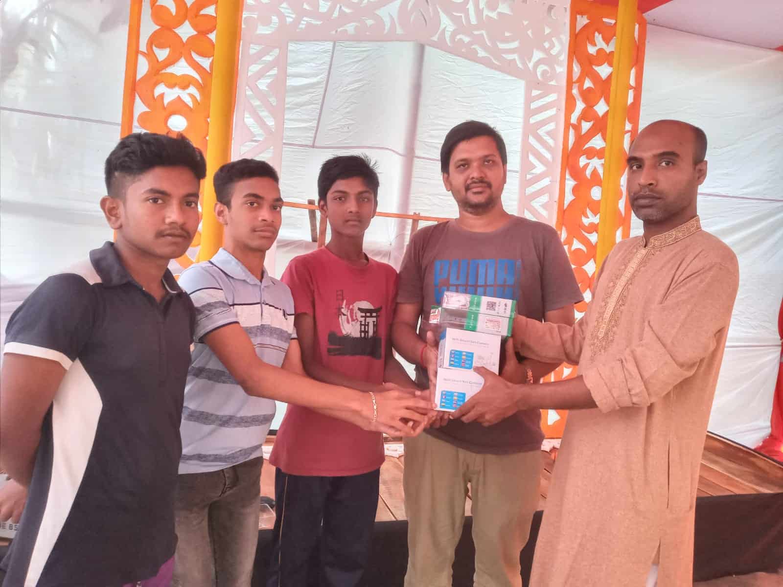 যশোরে কালী মণ্ডপে সিসি ক্যামেরা প্রদান অনুষ্ঠানে অংশগ্রহণকারীরা. Channel i News - চ্যানেল আই নিউজ