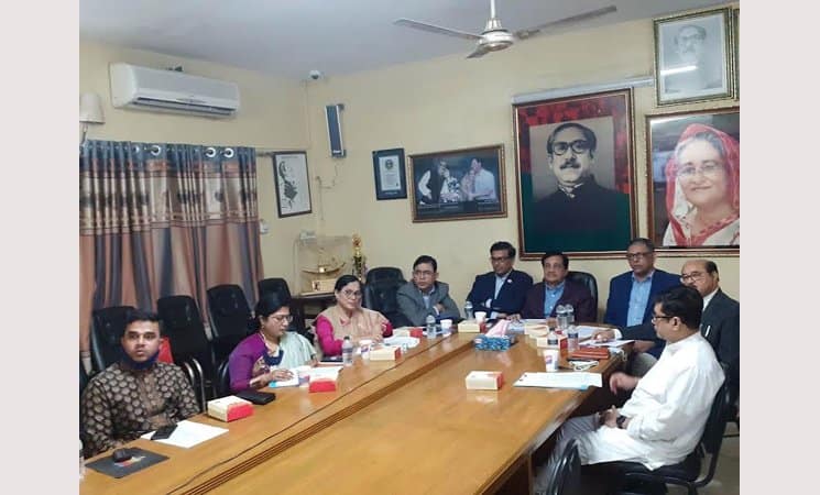 রাজনৈতিক আলোচনা সভায় অংশগ্রহণকারী নেতারা বসে আলোচনা করছেন. Channel i News - চ্যানেল আই নিউজ