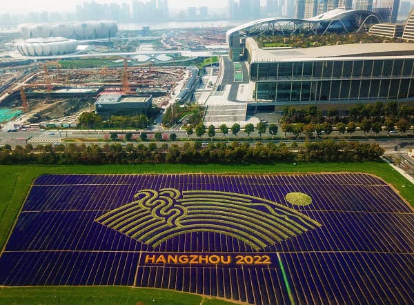 Hangzhou 2022 Asian Games logo on a large field in China. Channel i News - চ্যানেল আই নিউজ