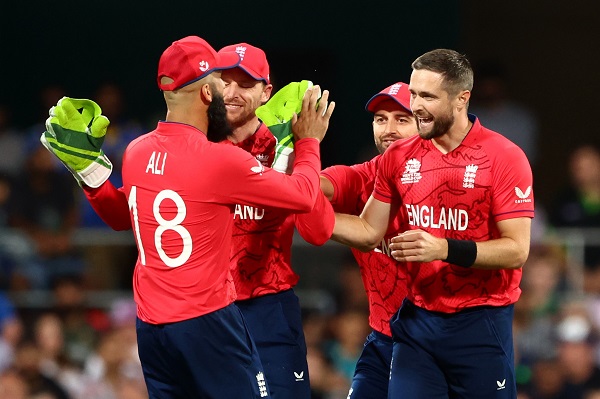 BRISBANE, AUSTRALIA - NOVEMBER 01: Chris Woakes of England celebrates after taking the wicket of Devon Conway of New Zealand during the ICC Men's T20 World Cup match between England and New Zealand at The Gabba on November 01, 2022 in Brisbane, Australia. (Photo by Chris Hyde-ICC/ICC via Getty Images)