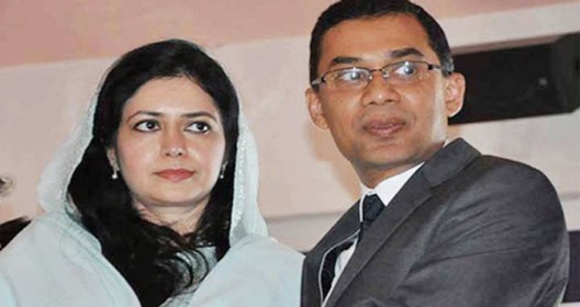 দুটি ব্যক্তি আদালত ভবনে হাজির, একজন মহিলা ও একজন পুরুষ. Channel i News - চ্যানেল আই নিউজ