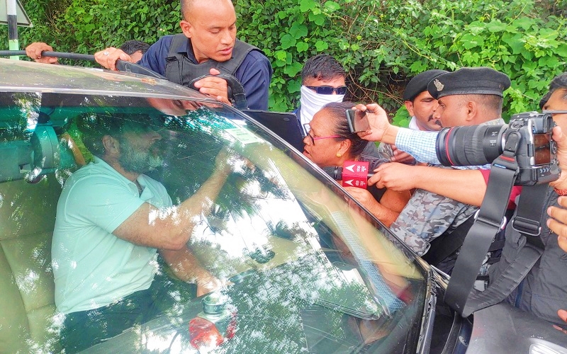 Supporters of Rahul Gandhi, a senior leader of India's main opposition Congress party, speak with him after his convoy, heading to Churachandpur, was stopped by the police in Bishnupur district, Manipur, India, June 29, 2023. REUTERS/Stringer