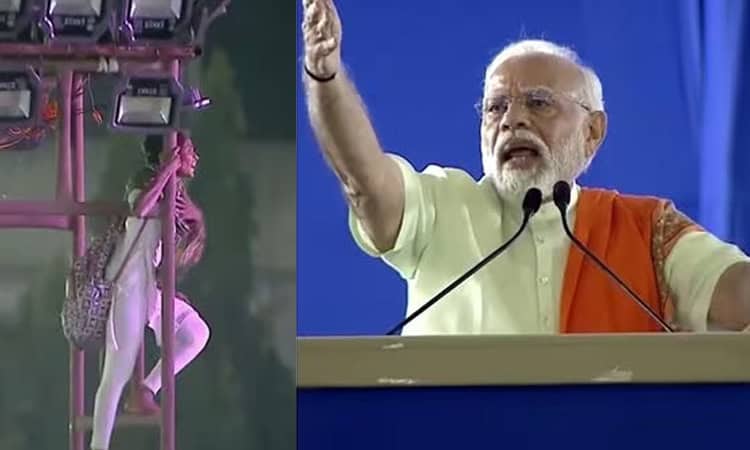 প্রধানমন্ত্রী মোদি ভাষণ দিচ্ছেন, পাশে নারী লাইট টাওয়ারে উঠেছেন. Channel i News - চ্যানেল আই নিউজ
