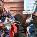 Bangladeshi men shielding from heat with water and cloths in the city. Channel i News - চ্যানেল আই নিউজ