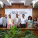 বই বিতরণ কর্মসূচিতে অংশগ্রহণকারী ব্যক্তিরা একসঙ্গে ছবি তুলছেন. Channel i News - চ্যানেল আই নিউজ