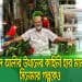 পিএসসির গাড়িচালক আবেদ আলী পাখির সঙ্গে হাসিমুখে দাঁড়িয়ে. Channel i News - চ্যানেল আই নিউজ