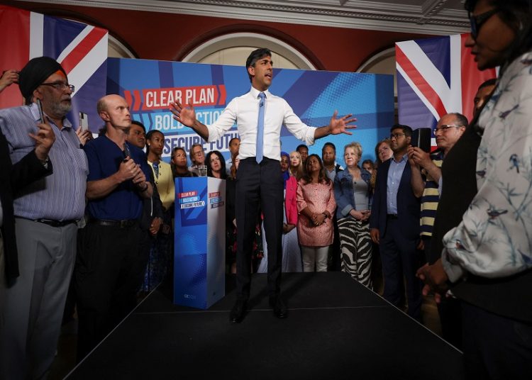 FLE PHOTO: British Prime Minister Rishi Sunak speaks during a Conservative general election campaign event, in London, Britain June 24, 2024. REUTERS/Phil Noble/File Photo