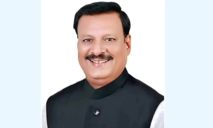 নেতা মোস্তাফিজুর রহমানের হাসিমুখের ছবি, পেশাদারী পোশাক পরা. Channel i News - চ্যানেল আই নিউজ