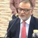 বাণিজ্য উপদেষ্টার সাক্ষাৎকারে কথা বলছেন একজন ব্যক্তি. Channel i News - চ্যানেল আই নিউজ