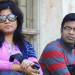 দুজন ব্যক্তি একটি পাথর দেয়ালের সামনে দাঁড়িয়ে আছেন।. Channel i News - চ্যানেল আই নিউজ