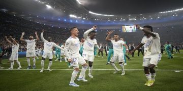Real Madrid players celebrate winning the Champions League final soccer match between Liverpool and Real Madrid at the Stade de France in Saint Denis near Paris, Saturday, May 28, 2022. Real Madrid won 1-0. (AP Photo/Kirsty Wigglesworth)