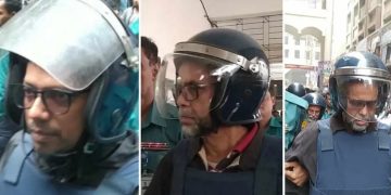 বাংলাদেশের পুলিশ ও আইনশৃঙ্খলা রক্ষাকারী বাহিনী সদস্যরা রাস্তায় নিরাপত্তা ব্যবস্থা গ্রহণ করছে।. Channel i News - চ্যানেল আই নিউজ