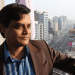 শিক্ষক মাহমুদুল হকের ছবি, ঢাকা শহরের ব্যস্ত রাস্তায়. Channel i News - চ্যানেল আই নিউজ