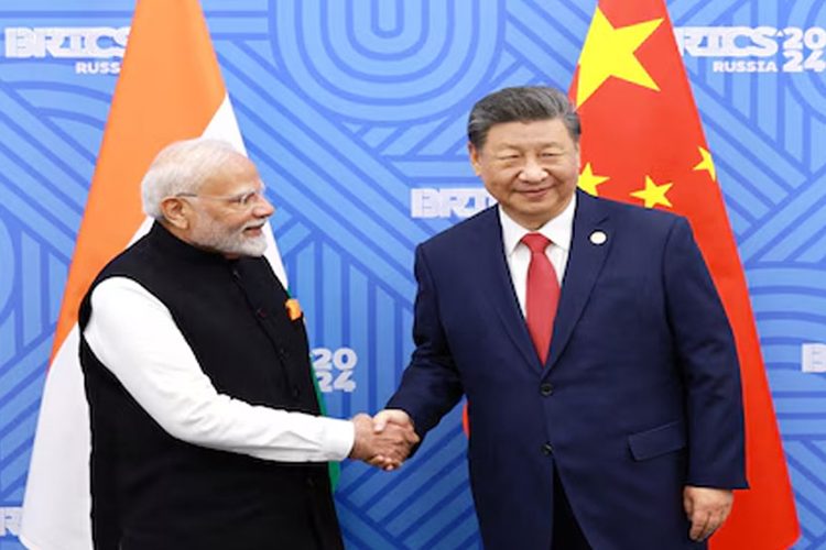 চীনের প্রেসিডেন্ট শি জিনপিং ও ভারতের প্রধানমন্ত্রী নরেন্দ্র মোদী।