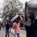 অভিবাসী শ্রমিকরা পাঞ্জাব থেকে গ্রামে ফিরছে, মুখে মাস্ক পরা. Channel i News - চ্যানেল আই নিউজ