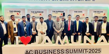 Yamuna AC Business Summit 2025 event with participants on stage. Channel i News - চ্যানেল আই নিউজ
