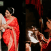 বাংলাদেশি ঐতিহ্যবাহী পোশাক পরিহিত দম্পতি পুজোতে অংশগ্রহণ করছেন. Channel i News - চ্যানেল আই নিউজ