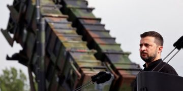 FILE PHOTO: Ukrainian President Volodymyr Zelenskiy looks on during a visit to a military training area to find out about the training of Ukrainian soldiers on the “Patriot” anti-aircraft missile system, at an undisclosed location, in Germany, June 11, 2024.   Jens Buttner/Pool via REUTERS/File Photo
