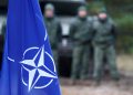 NATO flag is seen during NATO enhanced Forward Presence battle group military exercise Silver Arrow in Adazi, Latvia October 5, 2019. REUTERS/Ints Kalnins